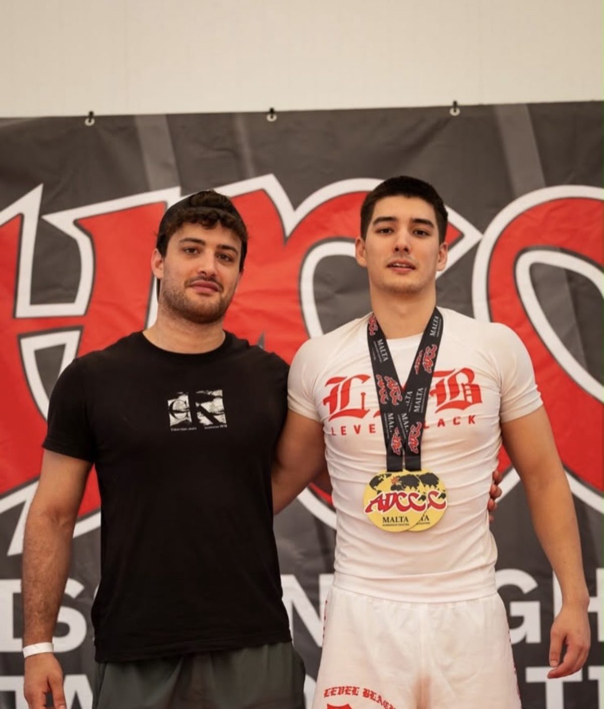 Flow State Grappling student winning a competition medal